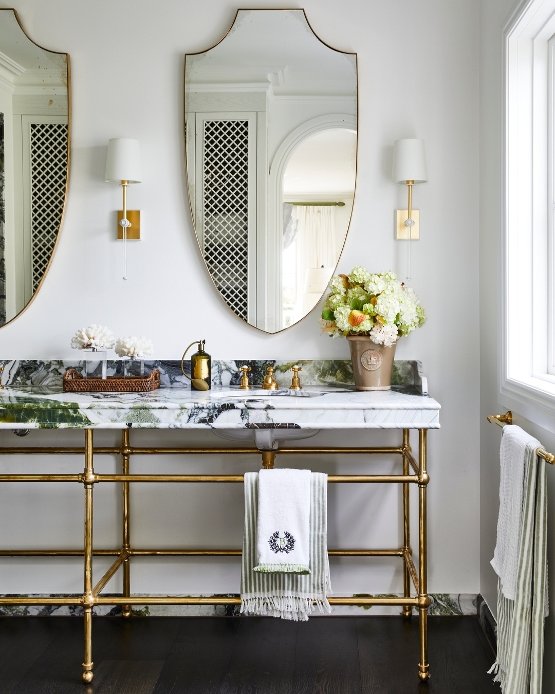 Shield-Shaped Mirrors Add a Vintage Touch to the Vanity
