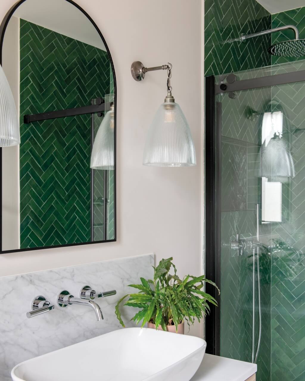 Articulated Arm Sconces With Fluted Glass Shades