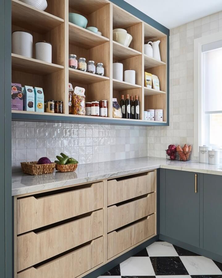 Wood-fronted drawers with integrated pulls create a streamlined look
