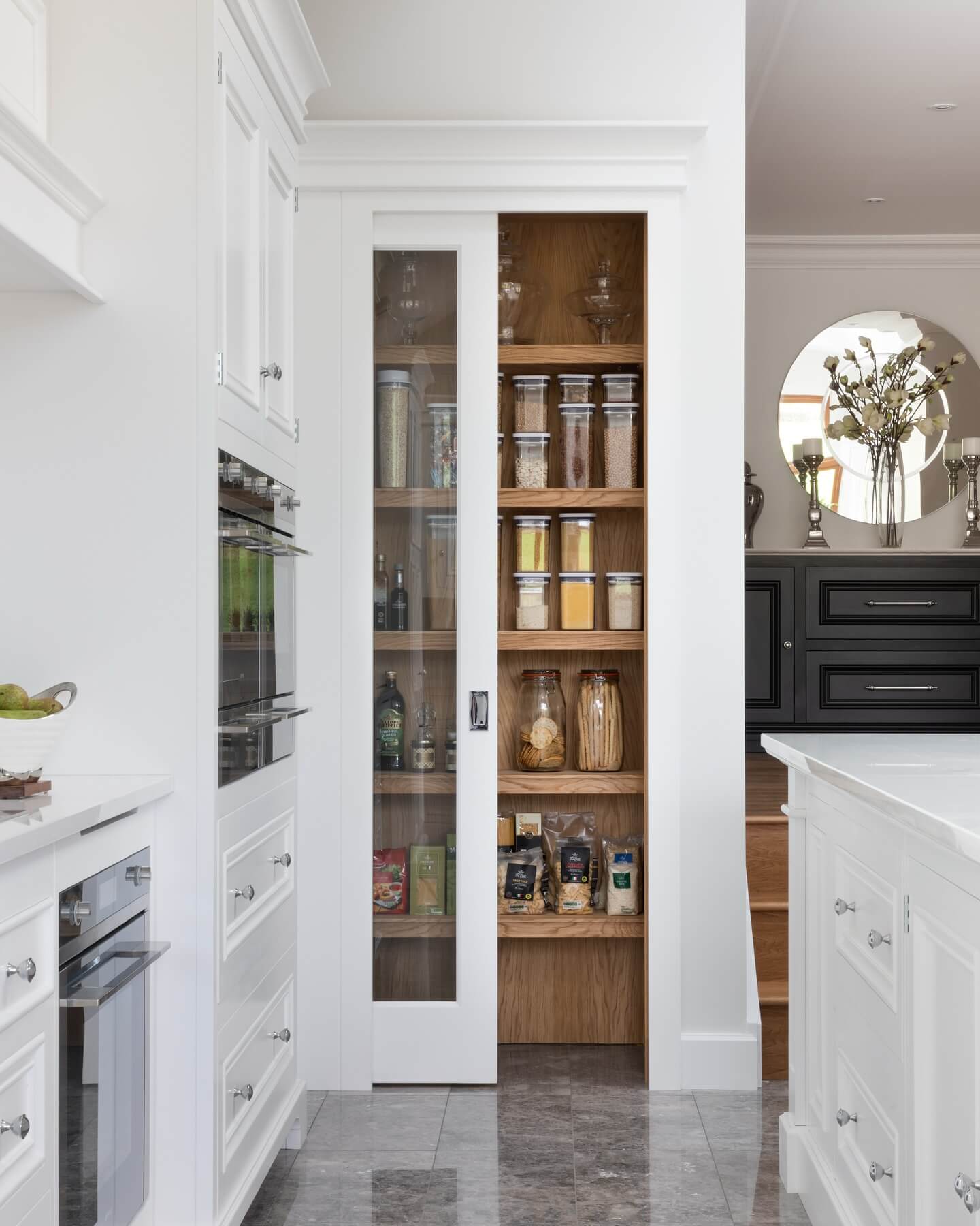 Glass pantry door with a slim, recessed handle
