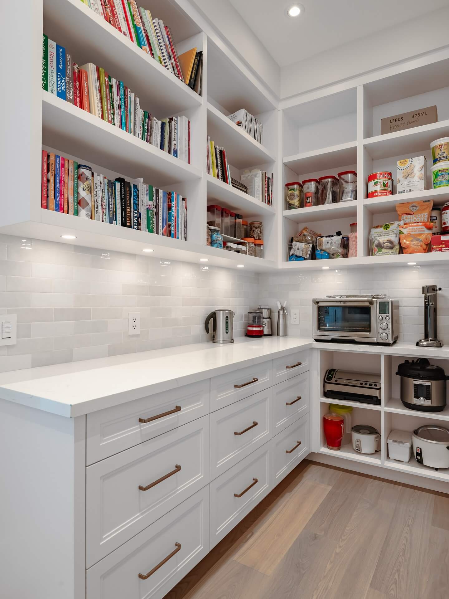 White subway tile backsplash adds a clean backdrop for appliances
