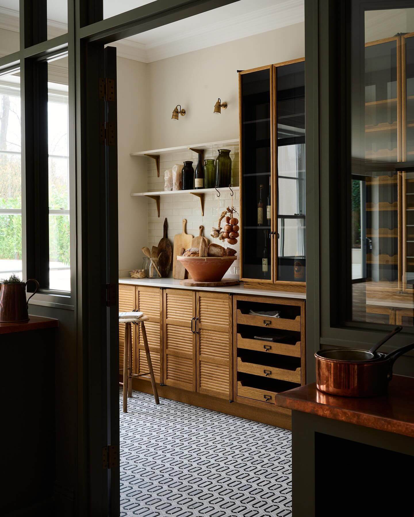 Slatted wood cabinet doors add tactile warmth to your pantry