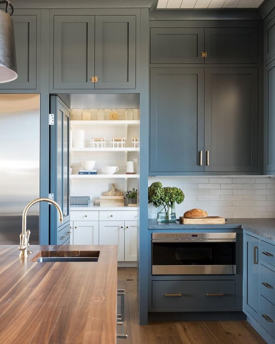 Concealed pantry doors hide clutter for a clean look