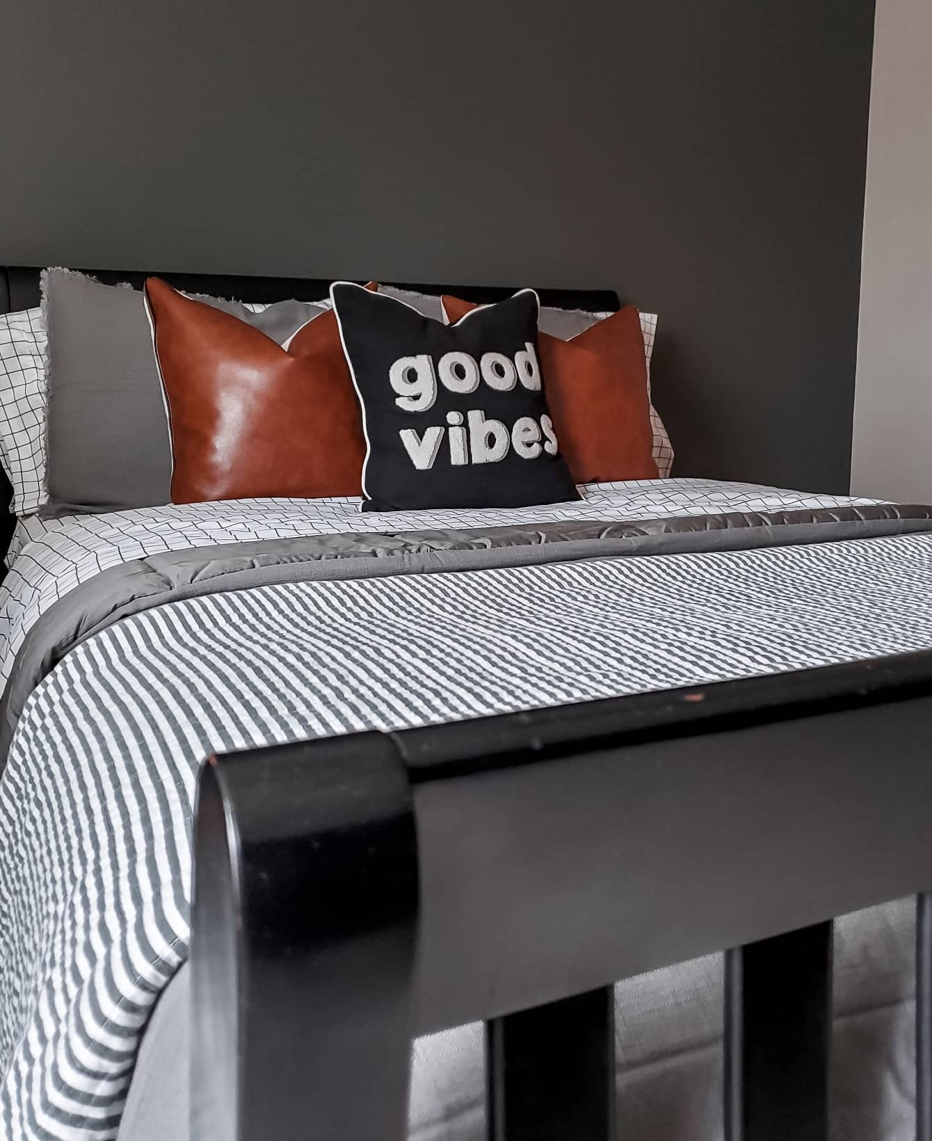 Leather Accent Pillows Add Rich Texture to Dark Bedding