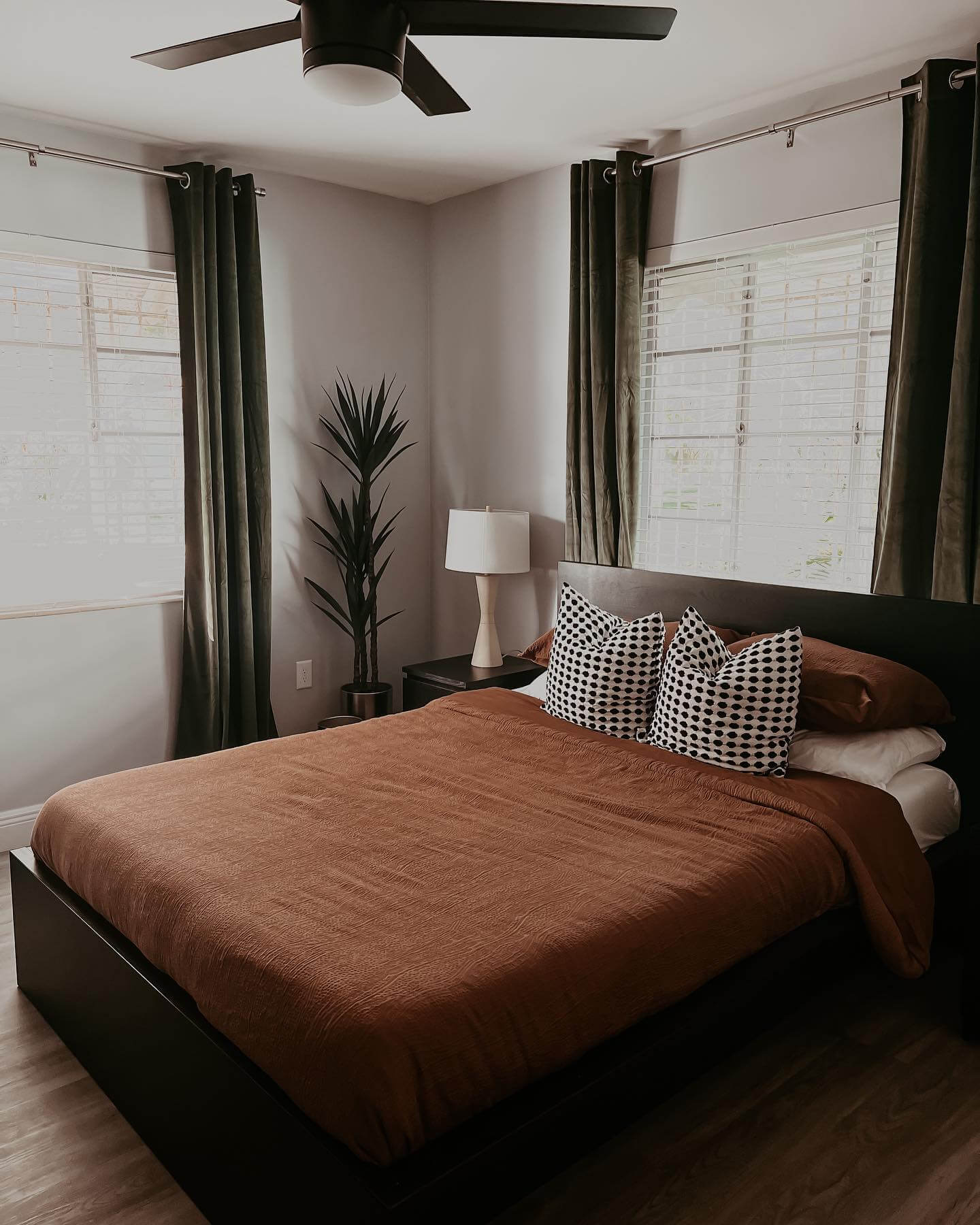 Deep Terracotta Bedding Creates a Warm, Grounded Feel