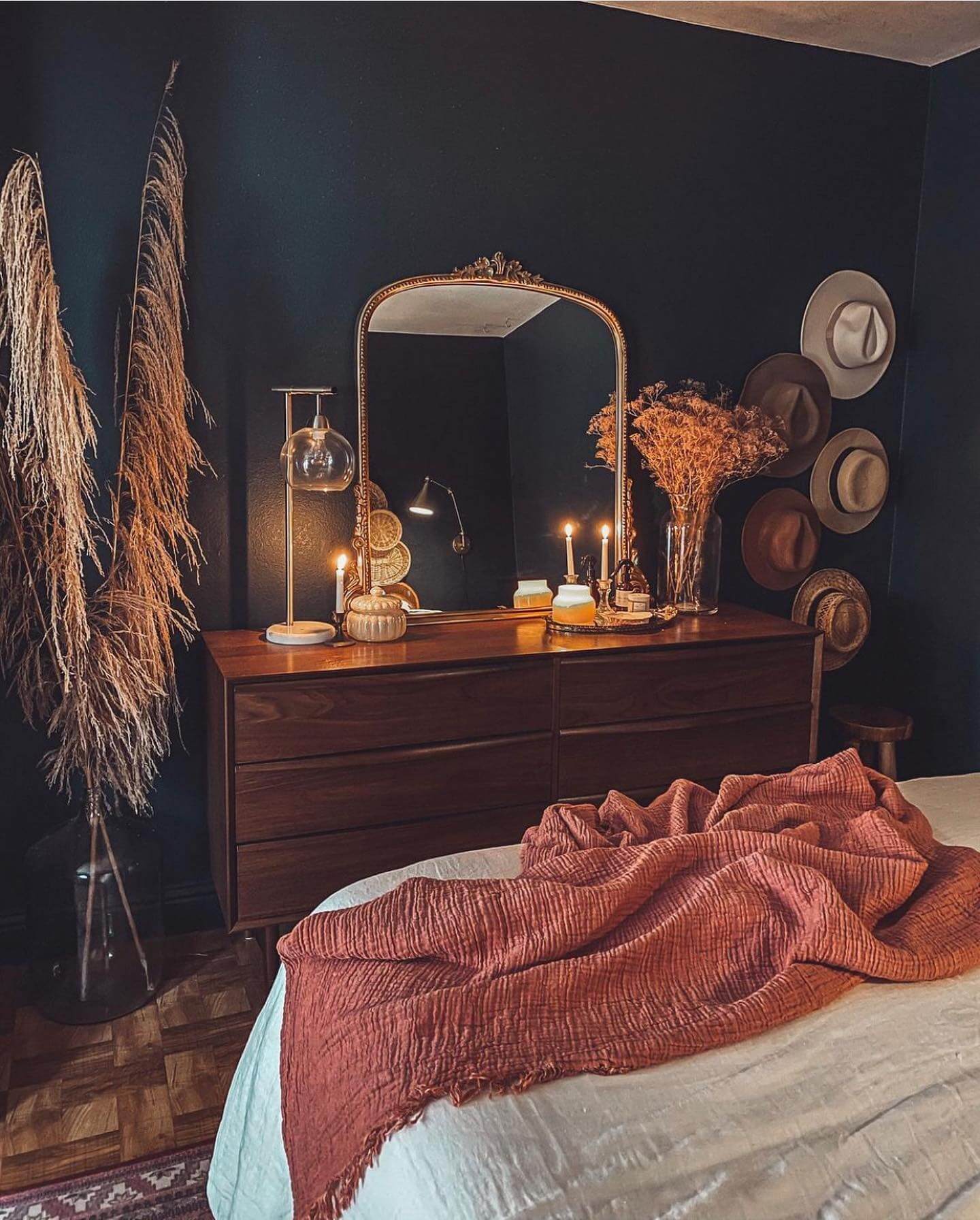 Wall-Mounted Hats Add Boho Texture to Dark Walls