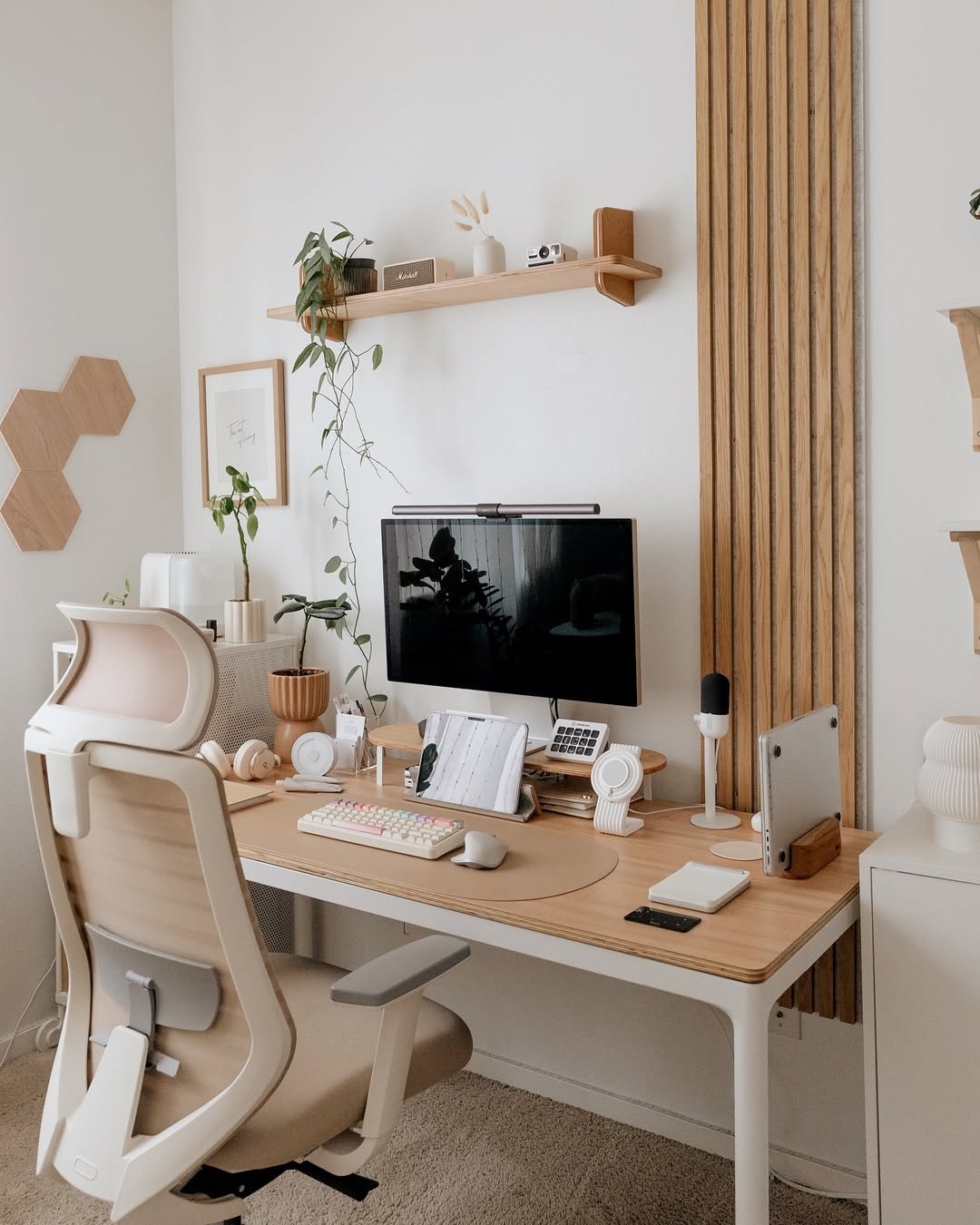 Wooden Slatted Wall Panel Adds Natural Texture Behind Desk