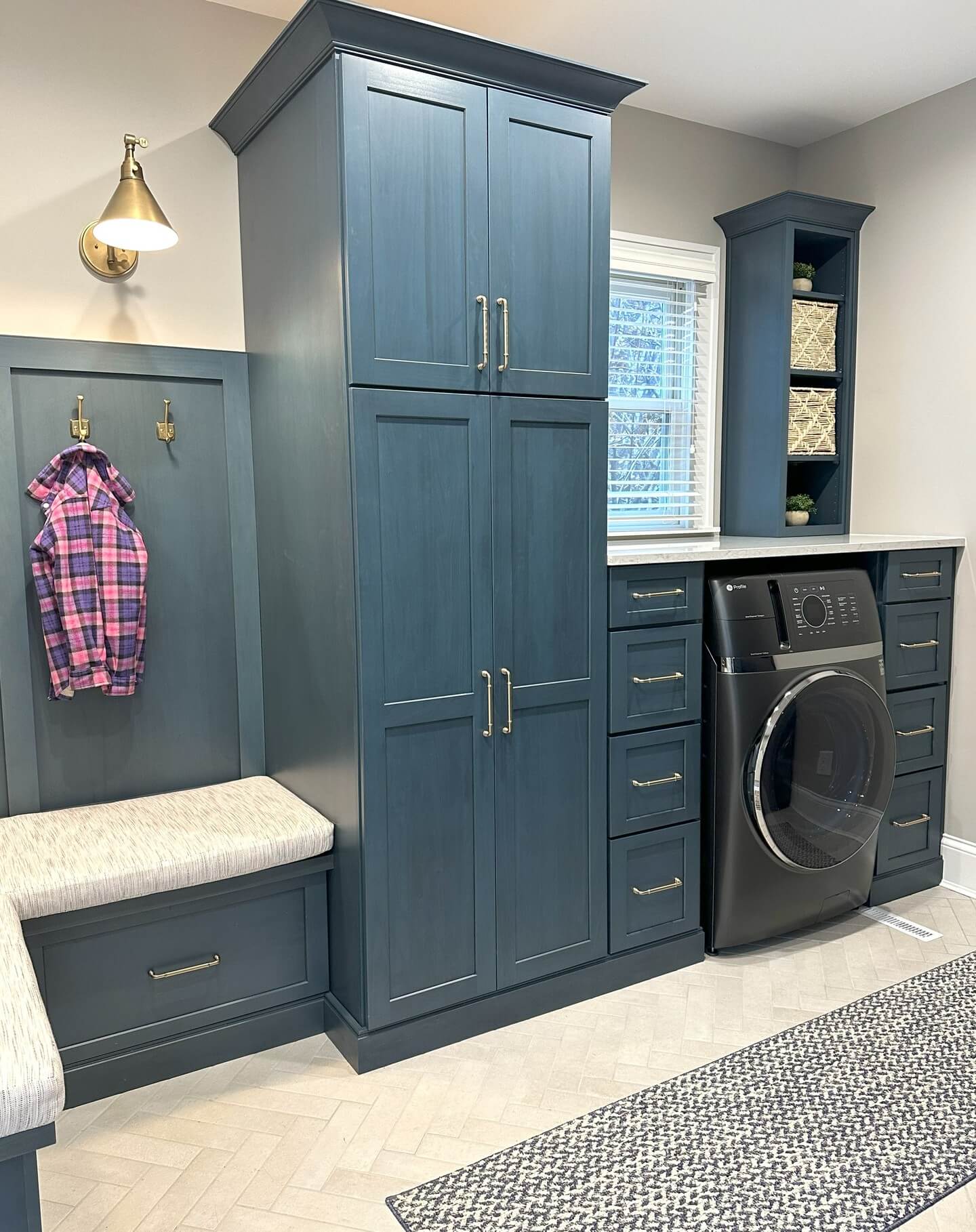 Deep Blue Cabinetry to Unify Mudroom and Laundry