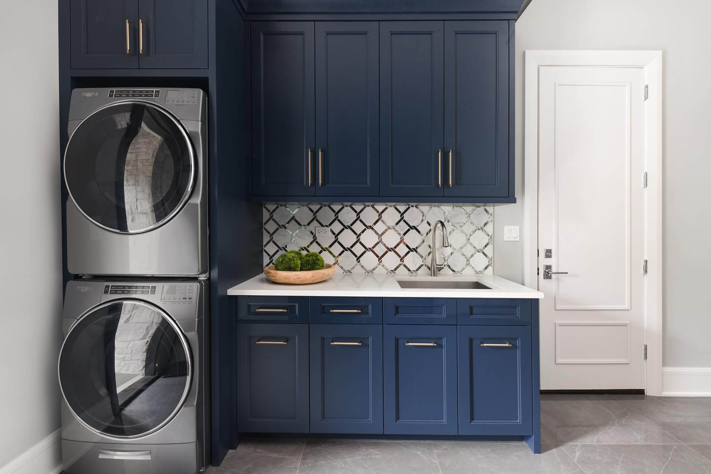 Geometric Mirror Tile Backsplash Adds Shine Behind The Sink