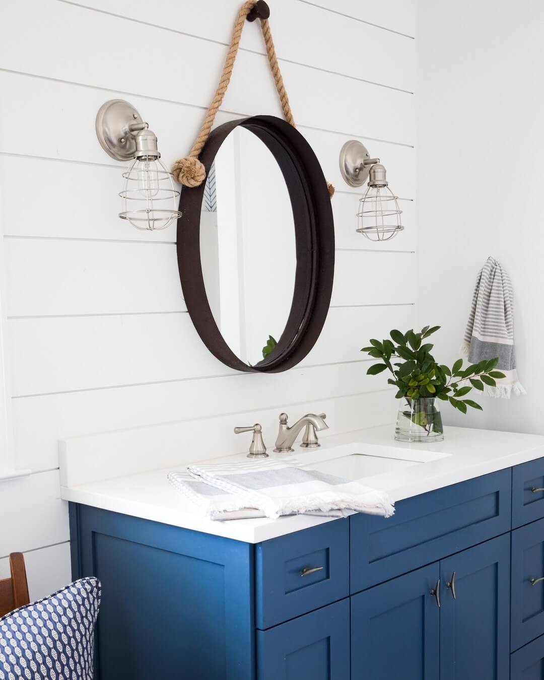 Round Mirror Hung With Thick Rope Adds Maritime Flair