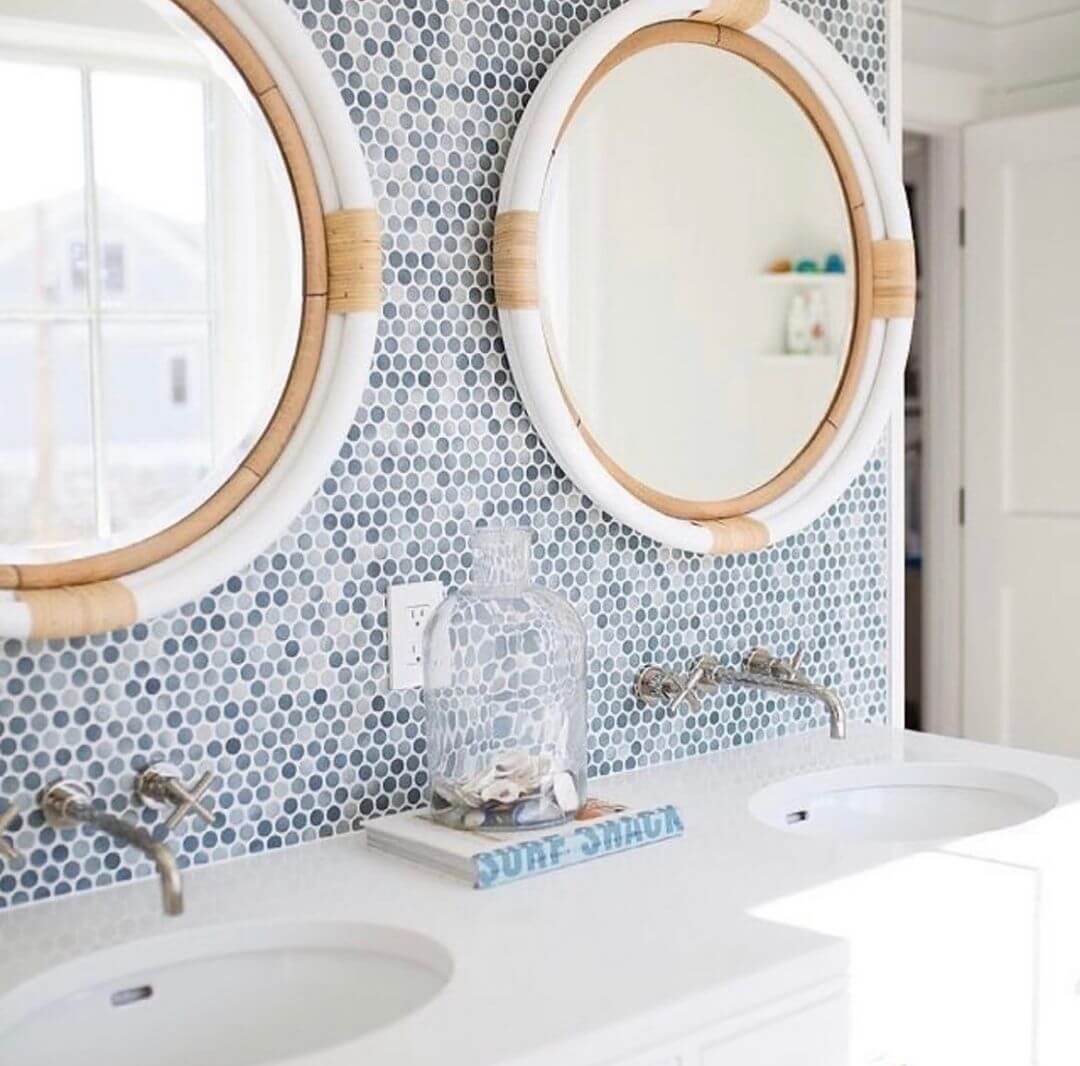 Penny Tile Backsplash Adds Coastal Texture Behind Rattan Mirrors