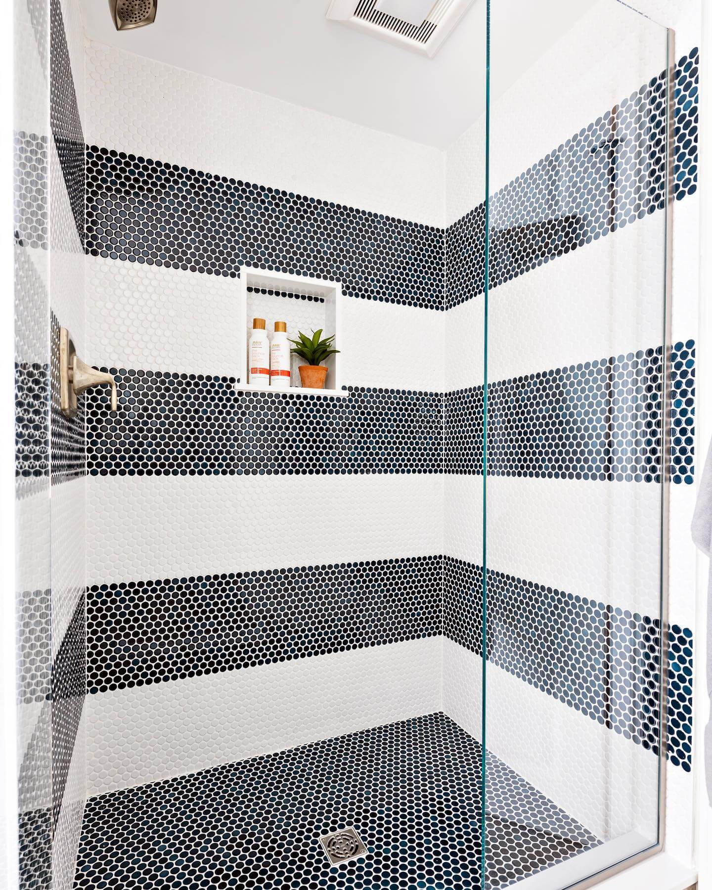 Penny Tile Stripes Create a Nautical Shower Accent