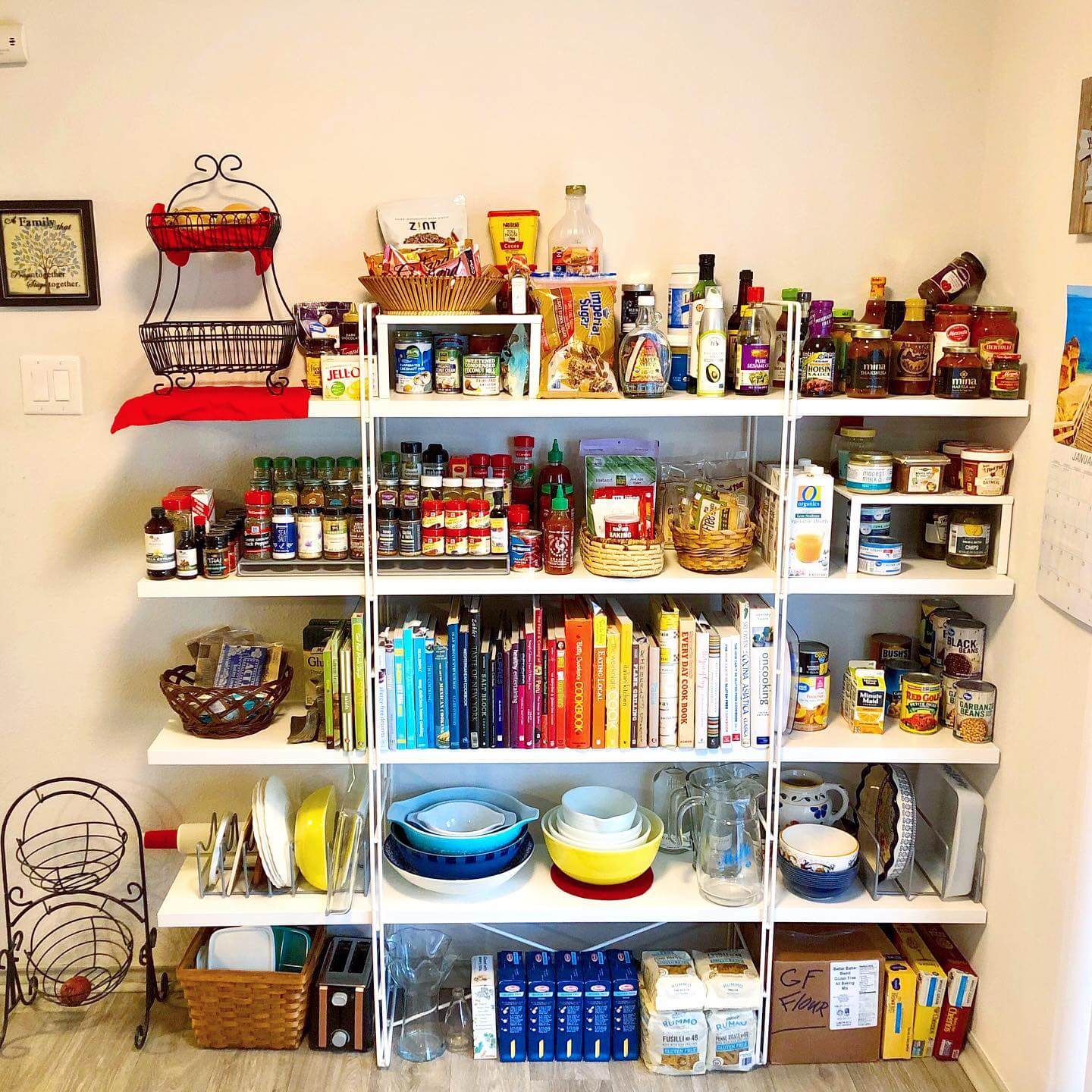 Grouped Spice Jars Add Color To Open Shelving