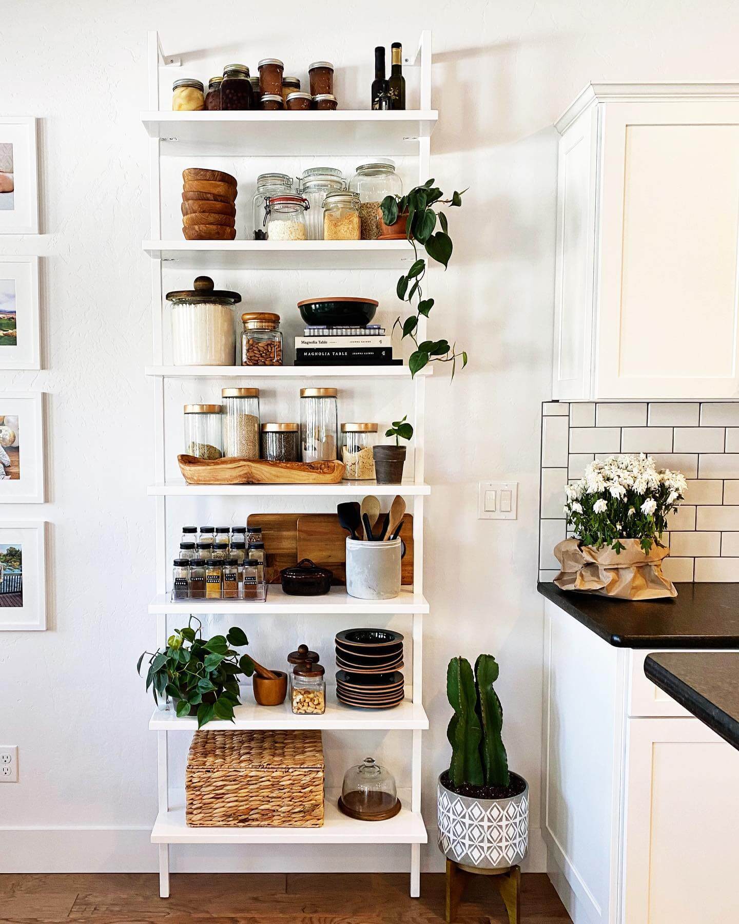 Wooden tray organizes jars of grains and spices
