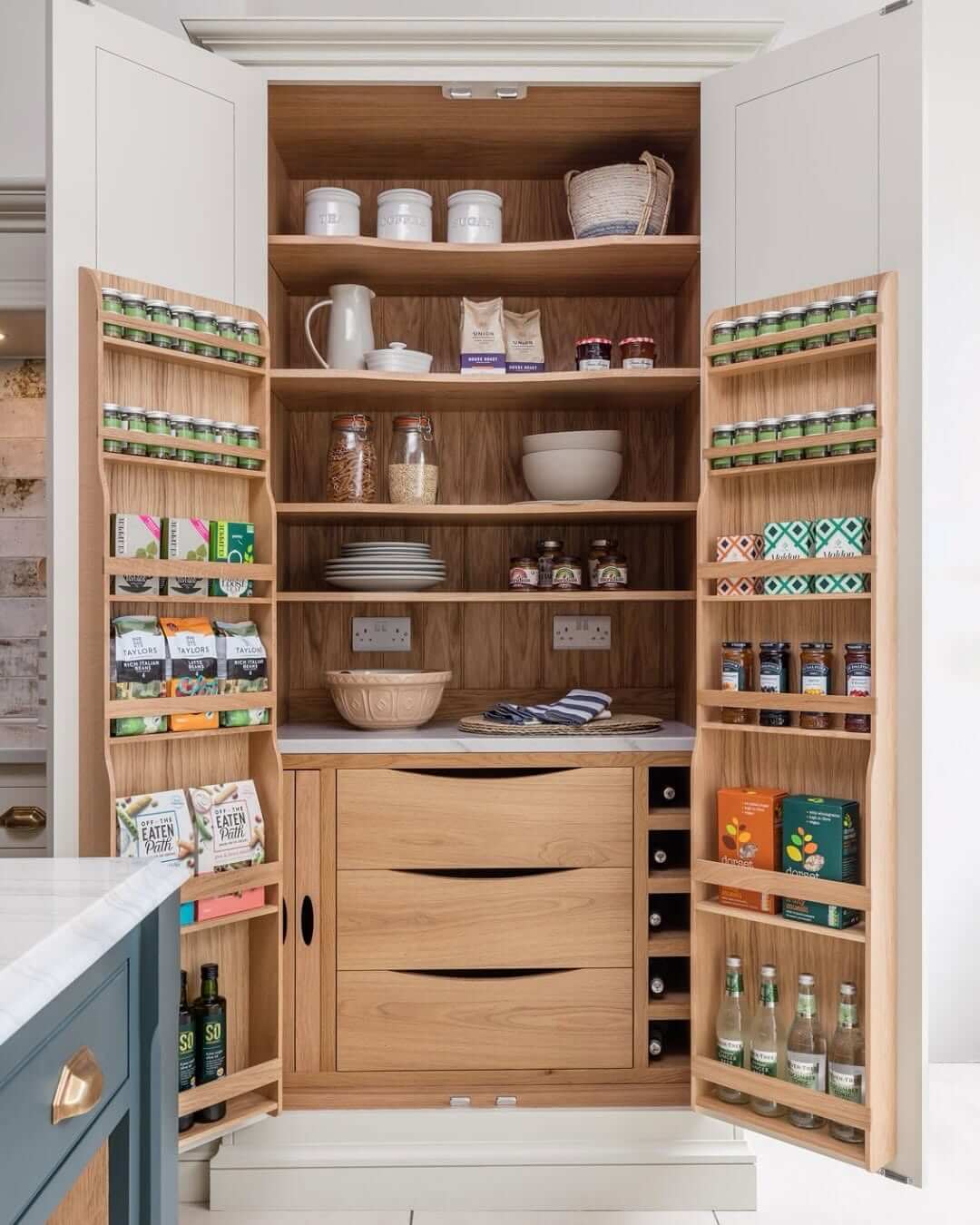 Angled Shelving on Pantry Doors for Jars and Bottles