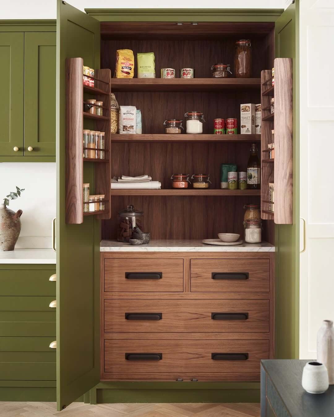 Integrated Walnut Spice Racks on Pantry Doors