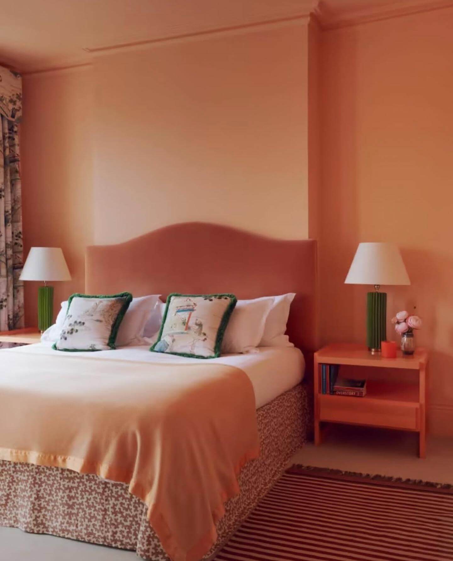 Green Lamps Add a Pop of Color to Peach Nightstands