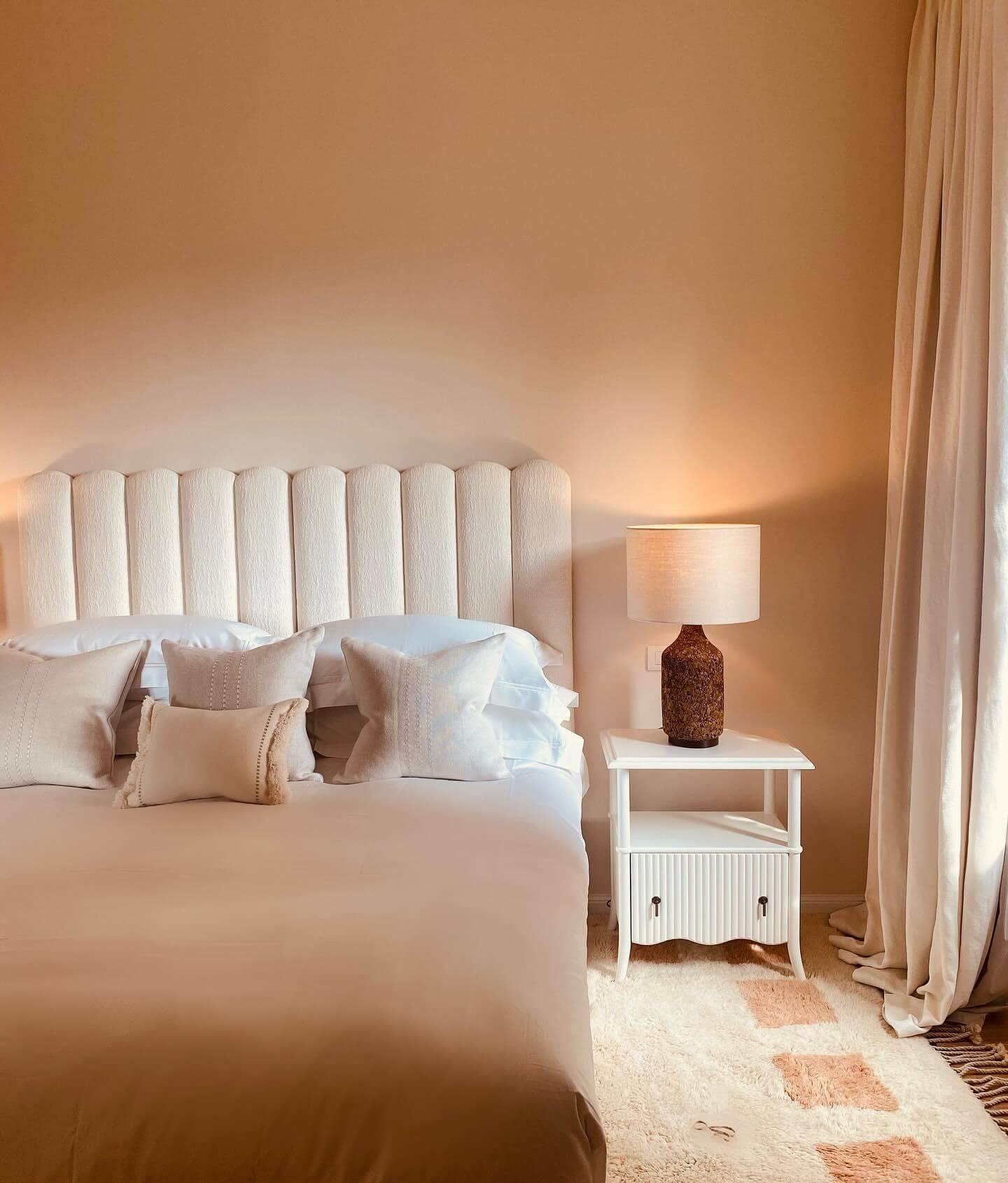 Fluted Nightstand Adds Subtle Detail to Peach Bedroom