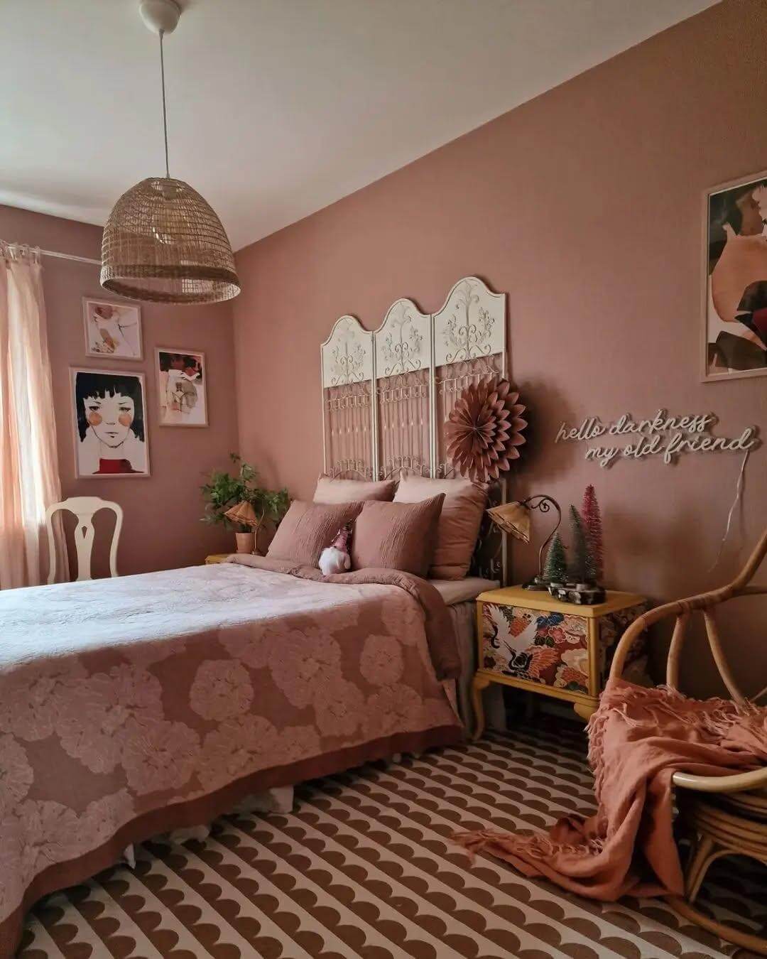 Ornate White Headboard Adds Vintage Flair Above Peach Walls
