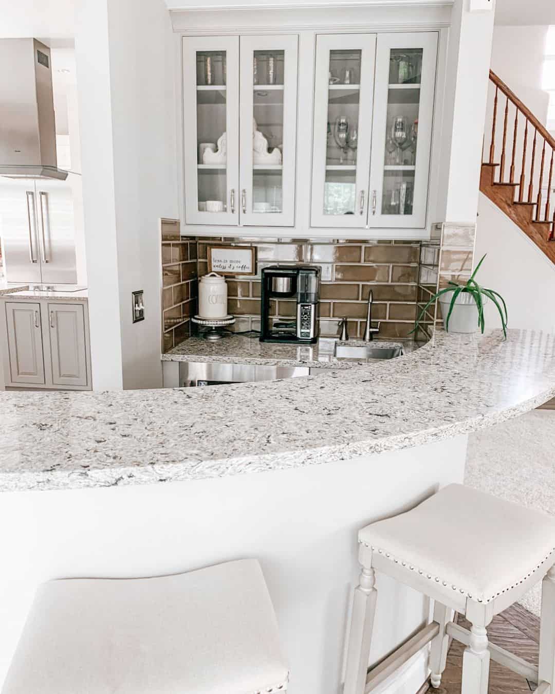 Brown Glass Subway Tile Adds Warmth Behind Granite