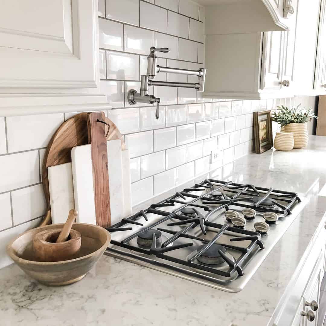 Pot Filler Faucet Above White Subway Tile