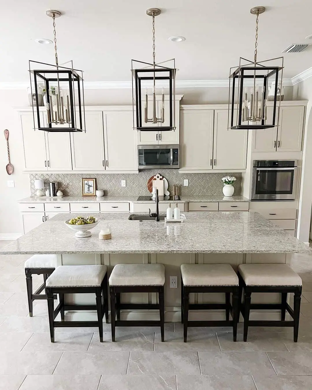 Geometric Backsplash Tiles Contrast With Busy Granite