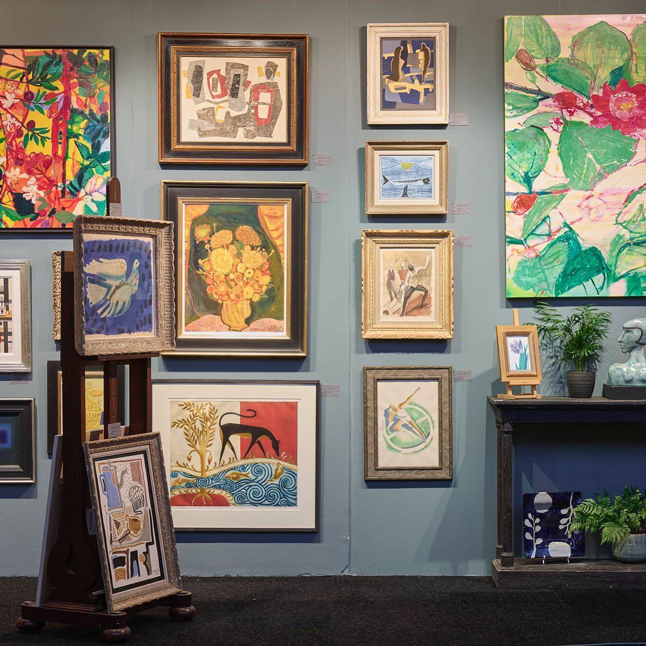 Art Display With Layered Easels and Floor Stands
