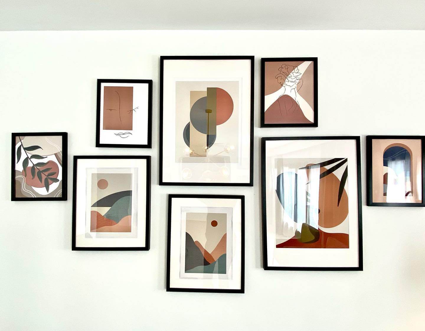 Abstract Mountain and Arch Motifs Create a Serene Gallery Wall