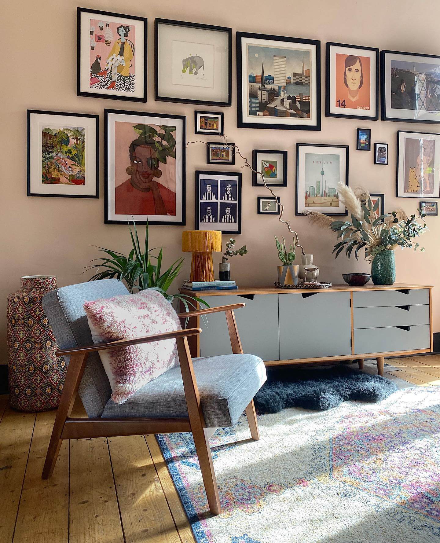 Gallery Wall With Varied Artwork and Black Frames