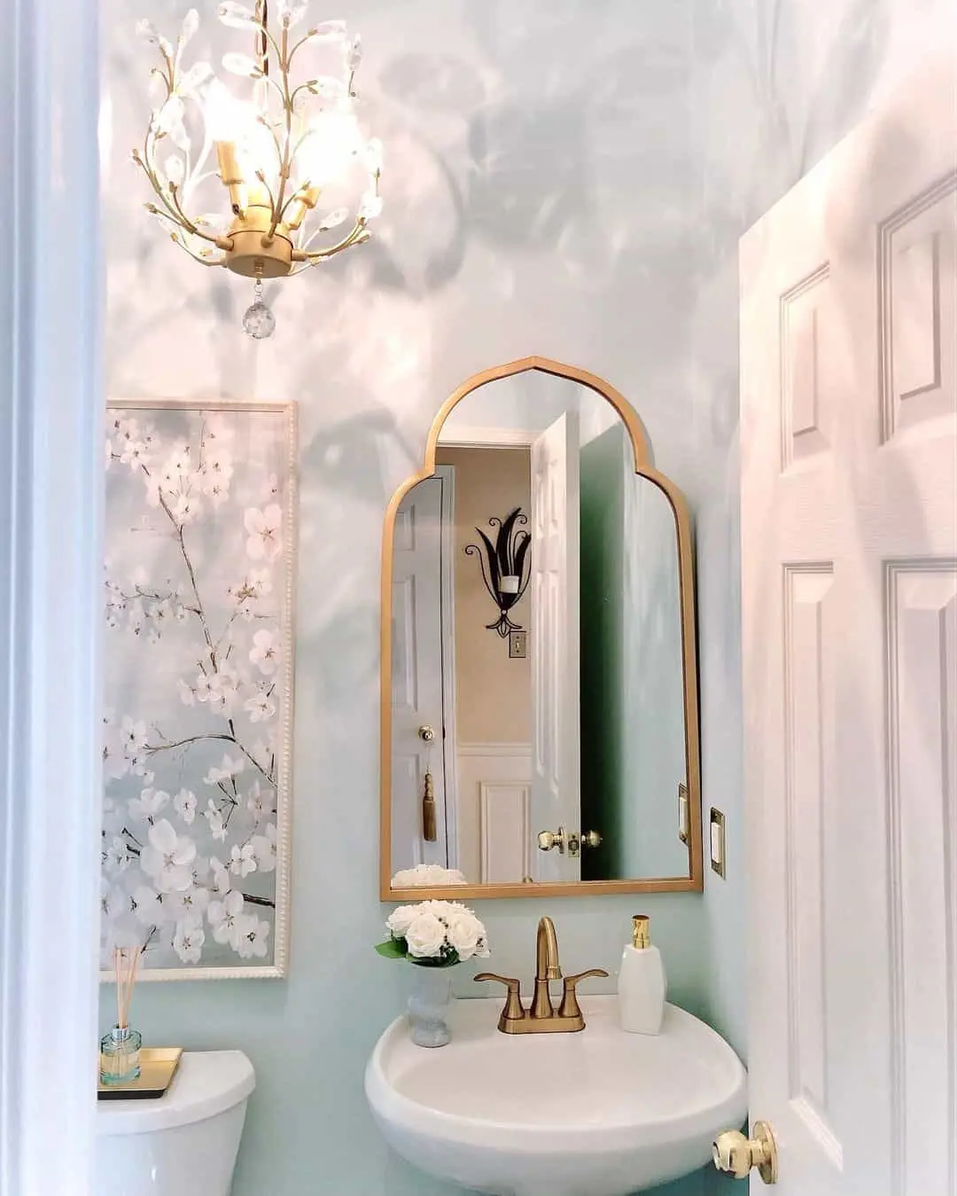 Glam Up a Small Powder Room with an Ornate Mirror