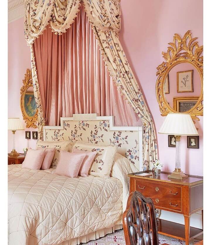 Floral Headboard and Drapes Frame a Romantic Pink Bedroom