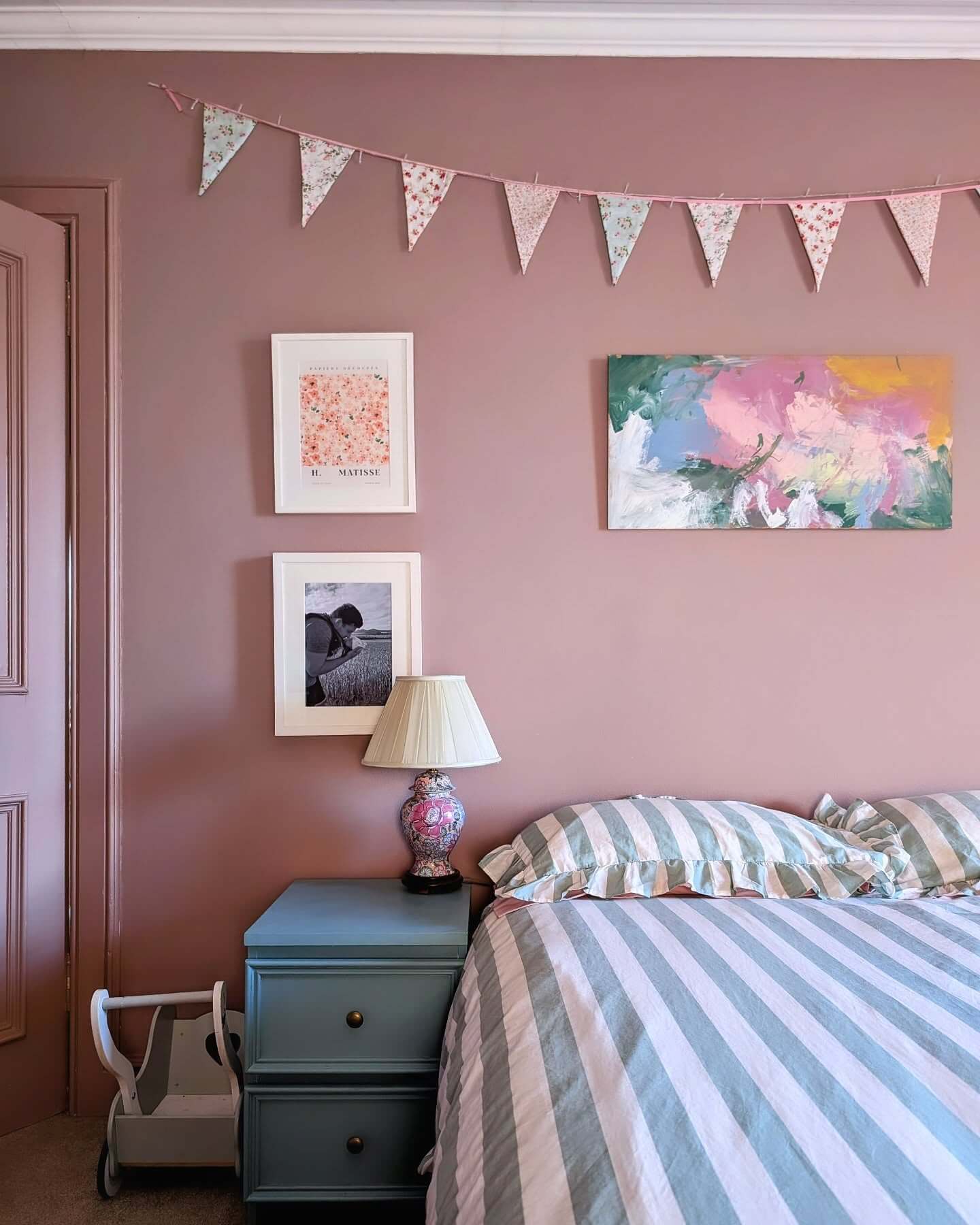 Fabric Bunting Adds Playful Pattern Above Artwork
