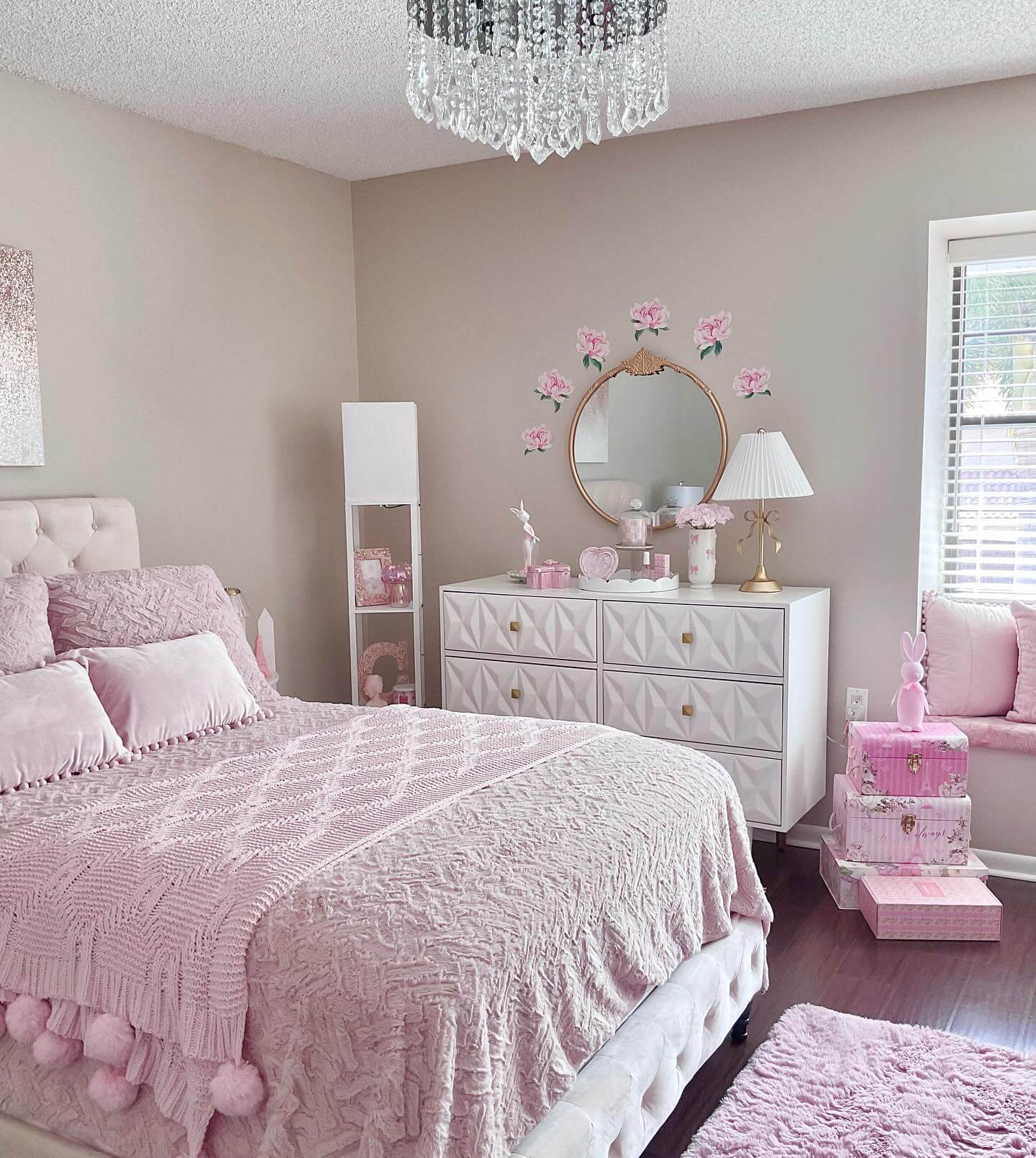 Pink storage boxes add whimsical charm