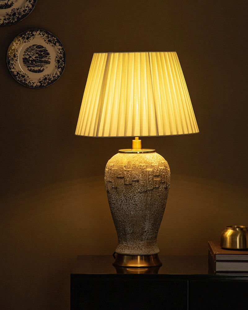 Textured Ceramic Lamp Adds Rustic Charm to a Dark Surface