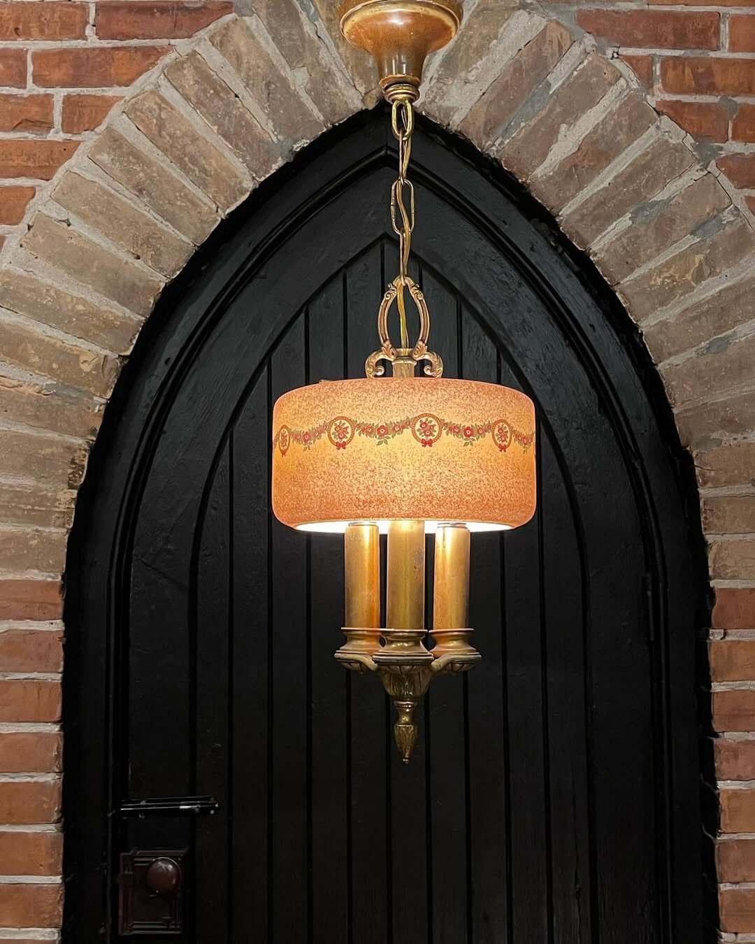 Ornate Chandelier with Floral Shade Adds Vintage Warmth