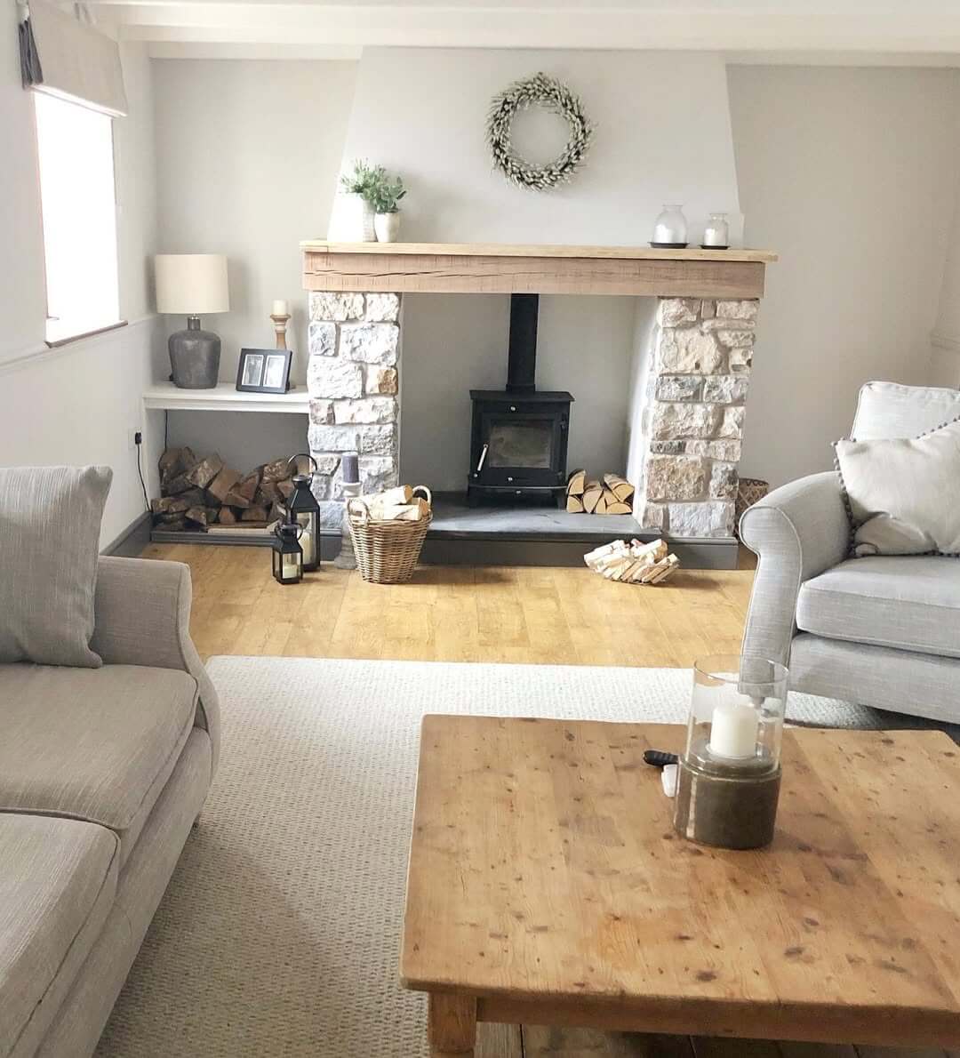 Frame the Fireplace Hearth with a Log Basket and Lanterns