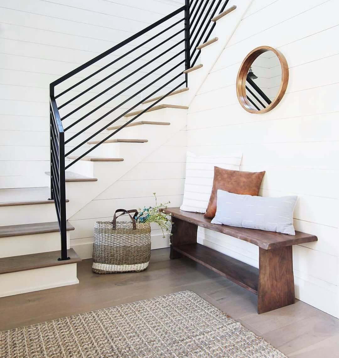 Live-Edge Bench Adds Organic Warmth to Shiplap Hallway