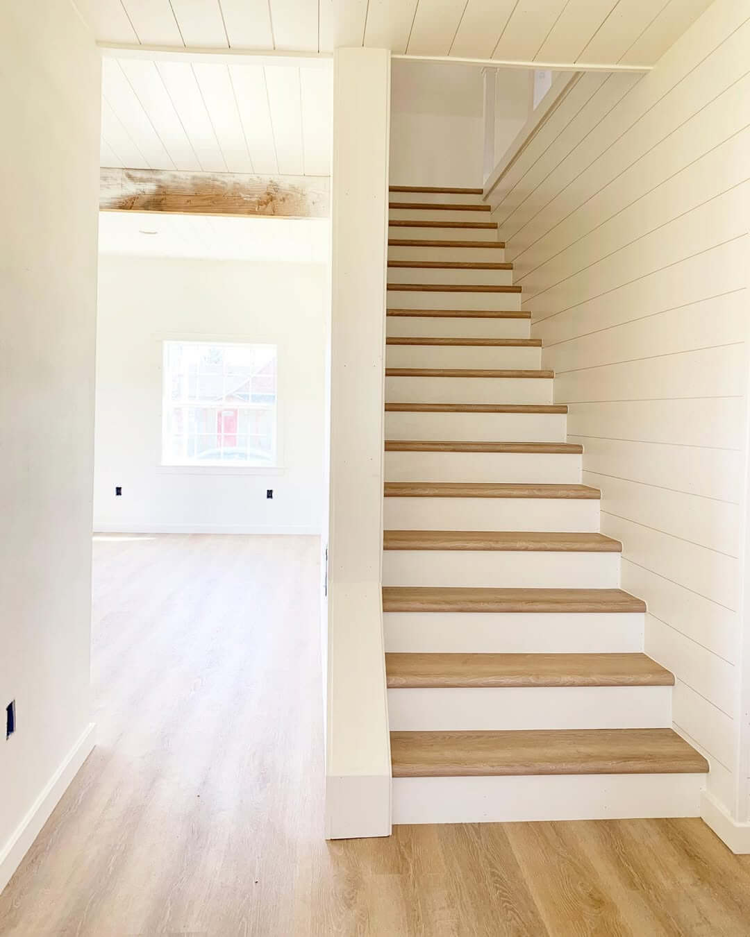 Frame Your Staircase with Shiplap and Natural Wood Treads