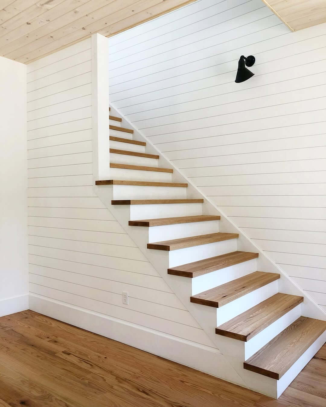 Contrast Natural Wood Treads with White Shiplap Risers