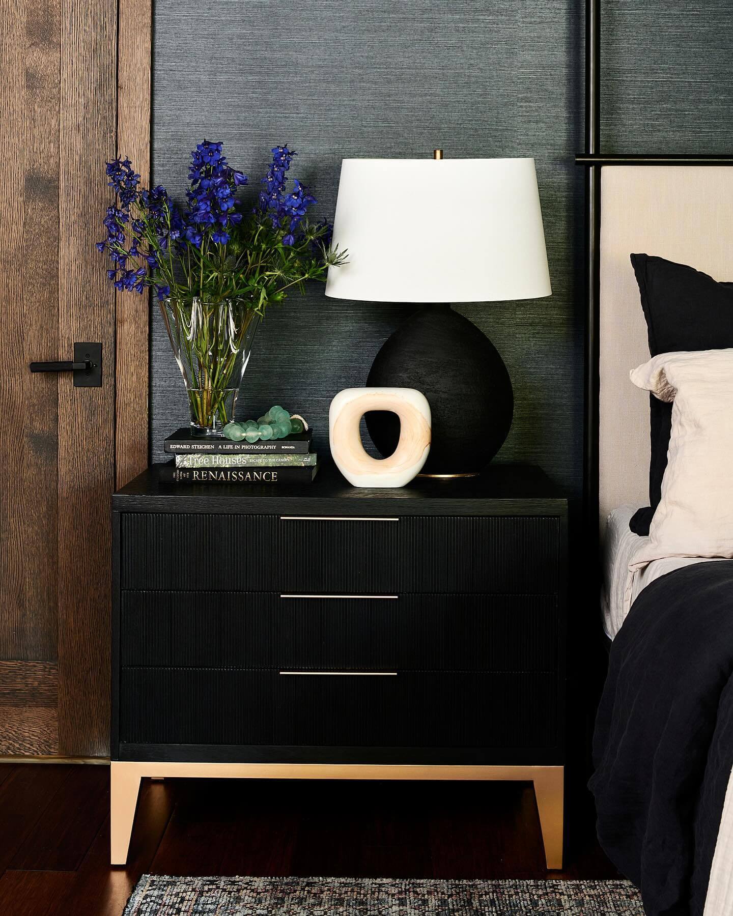 Ground Your Bedside with a Black Nightstand's Fluted Design