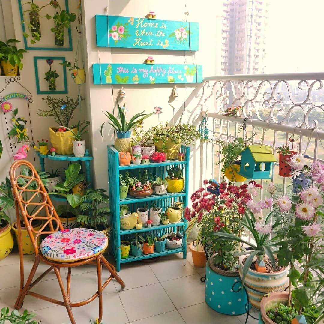 Turquoise Tiered Shelf Organizes Small Plants and Decor