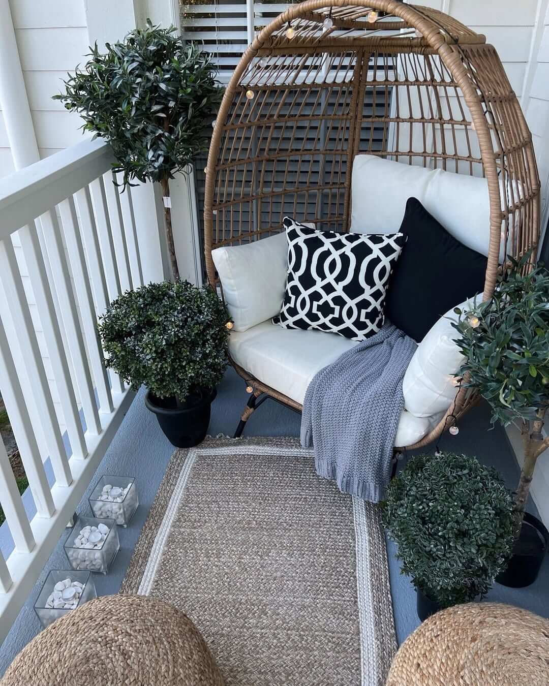 Woven Egg Chair Creates a Cozy Balcony Nook