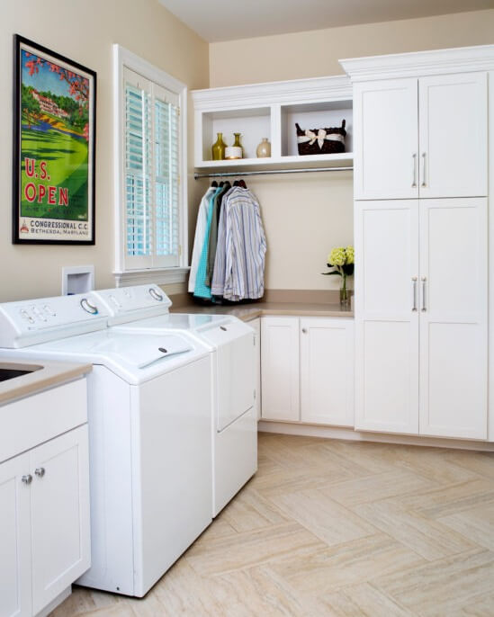 Open Shelving Above a Drying Rod Holds Decorative Accents