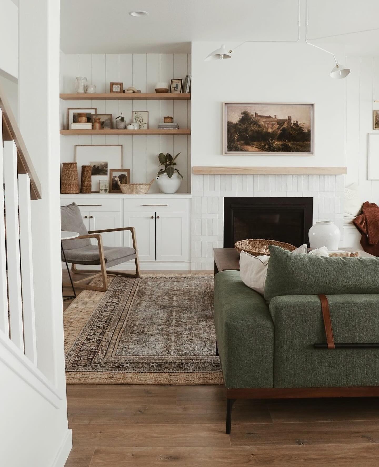 Landscape Artwork Adds a Serene Focal Point Above the Fireplace