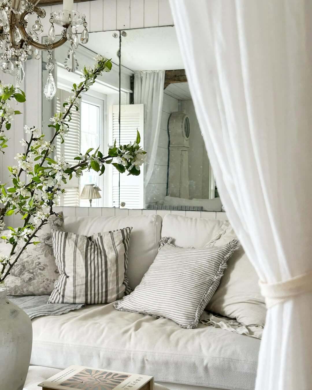 Distressed Mirrored Panels Add Vintage Charm to Walls