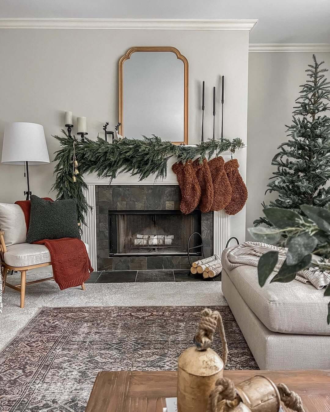 Arched Mirror Adds Warmth Above the Fireplace Mantel