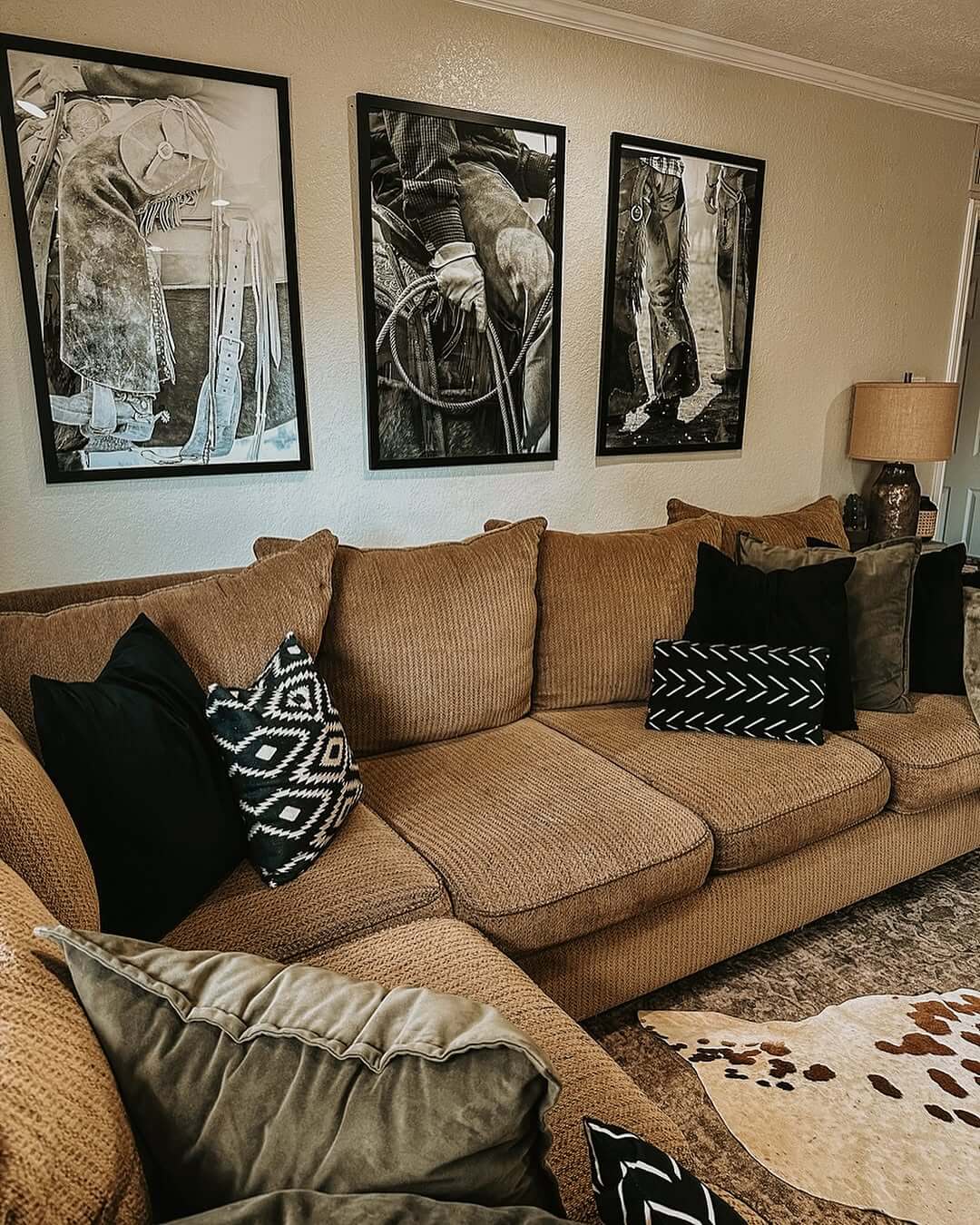 Triptych Artwork Adds Western Flair Above a Sectional Sofa