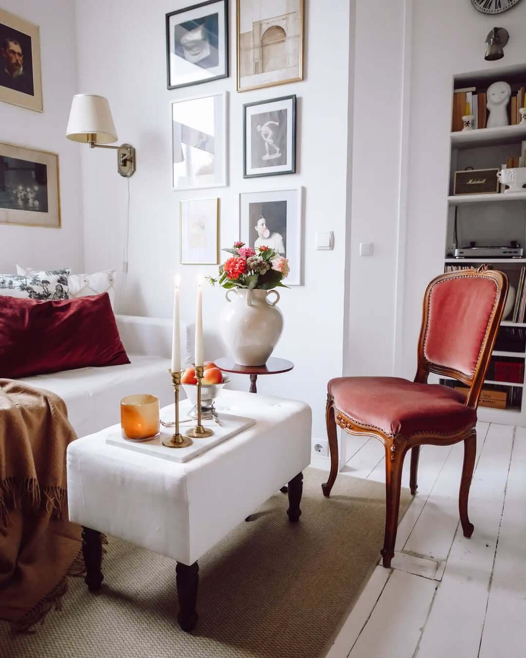 White Ottoman Doubles as Coffee Table and Display Surface