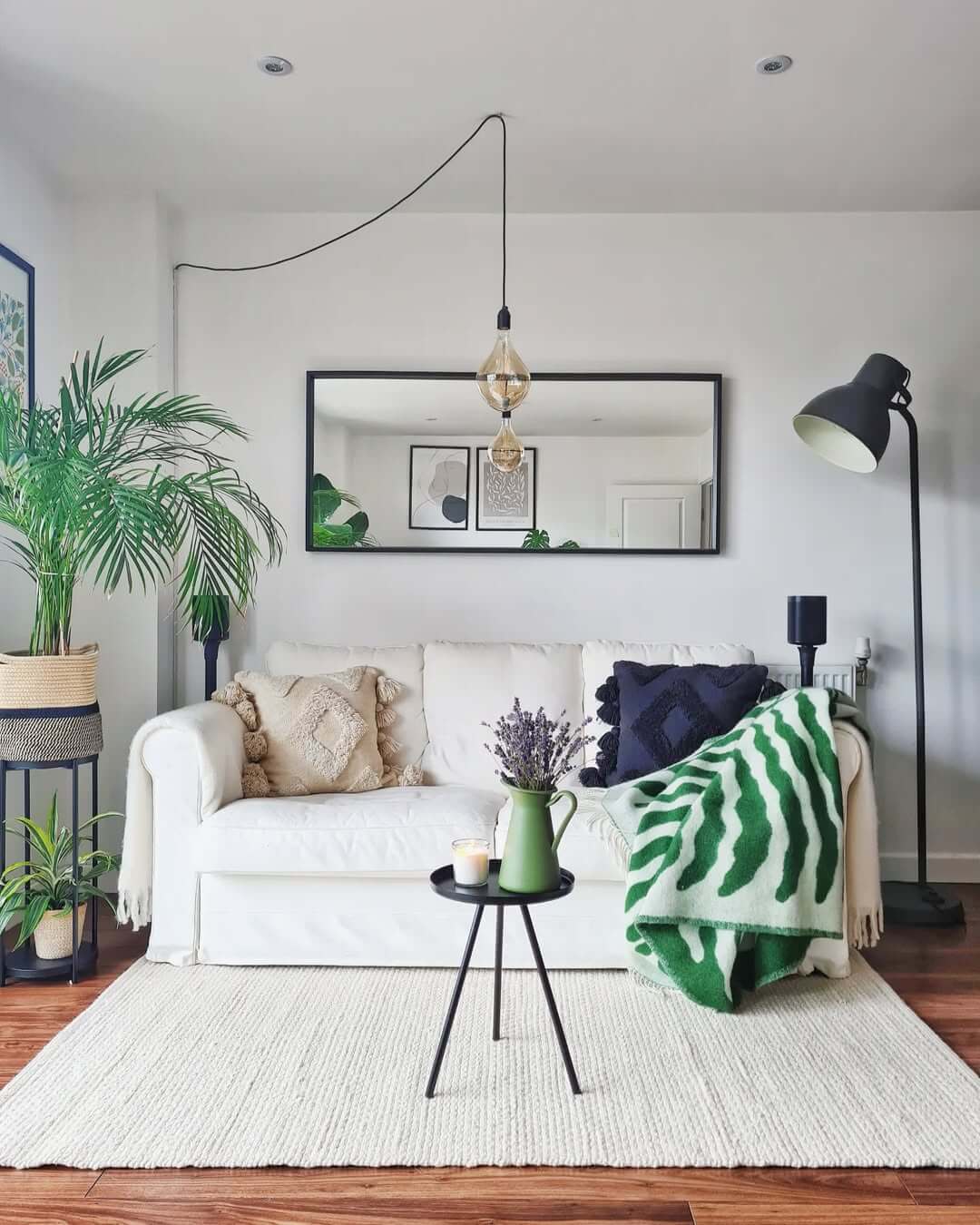 Black Tripod Table Adds a Compact Accent Surface