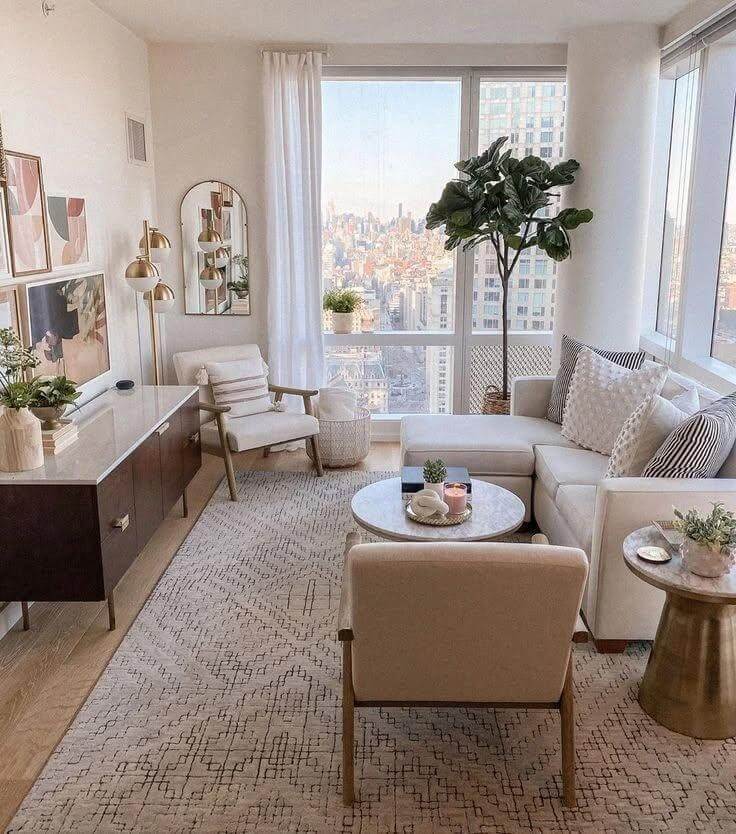 Arched Mirror Reflects Natural Light and City Views